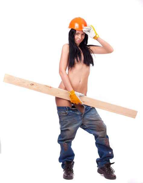 Topless girl in working clothes in the orange helmet - Фото, изображение