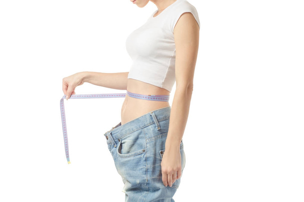 Woman is thin with slimness big size a centimeter - Φωτογραφία, εικόνα
