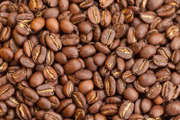 Roasted brown coffee beans as background - Fotó, kép