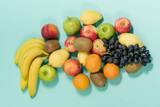 Mix fruits background.Fresh fruits close up.Healthy eating - Photo, Image
