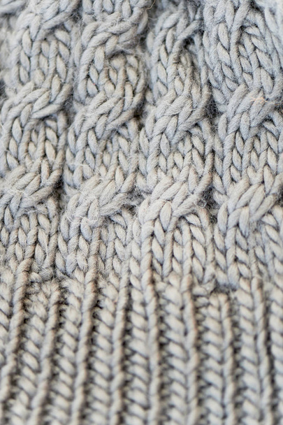 The texture is close.Scarf, hat or sweater knit. Needlework - Foto, afbeelding