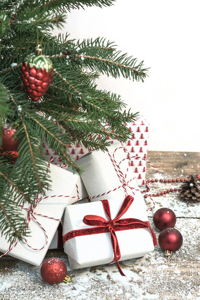 Christmas holiday background. Gifts under christmas tree. - 写真・画像