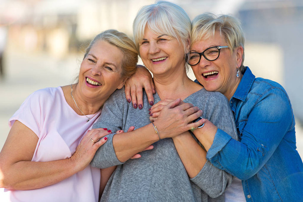Group of smiling senior women standing outside - Zdjęcie, obraz