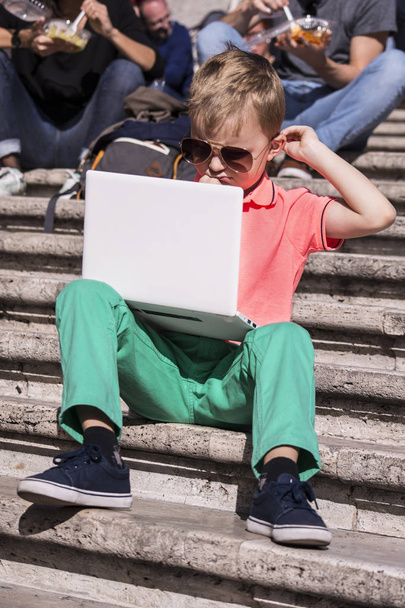 funny boy playing a laptop  - Photo, Image