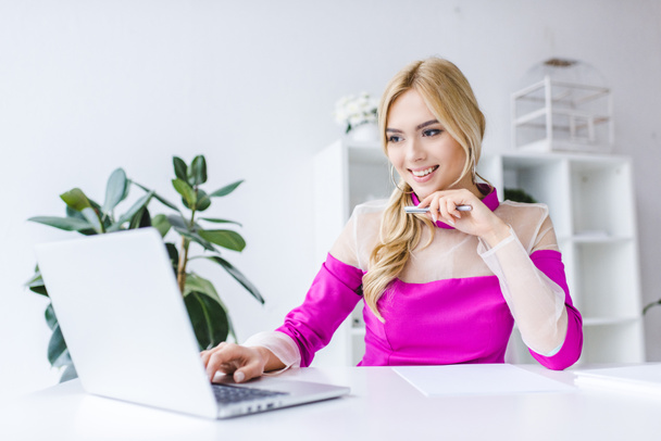 happy businesswoman working with laptop  - Photo, Image