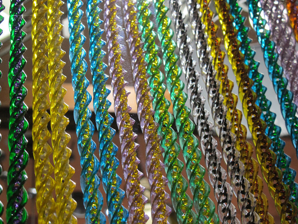 Barras de cortina enrolladas con muchos colores
 - Foto, Imagen