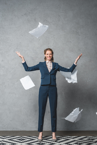 businesswoman throwing documents - Photo, Image