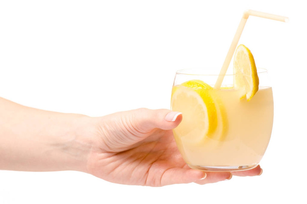 Glass of lemonade lemon female hand - Photo, Image