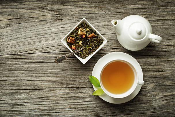 Tea in cup with dry tea collection - Foto, Imagen