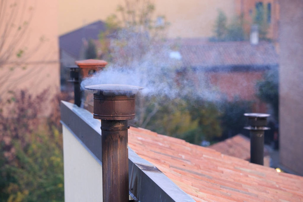 Smoking chimney of an house - Photo, Image