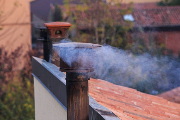 Smoking chimney of an house - Photo, Image