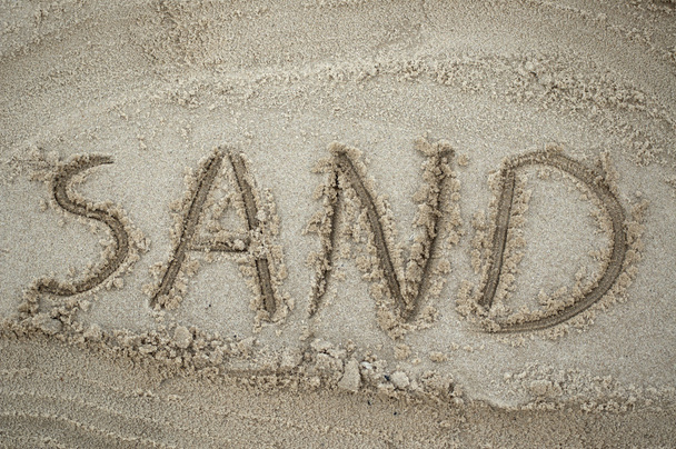 felirat "homok" a homok - Fotó, kép