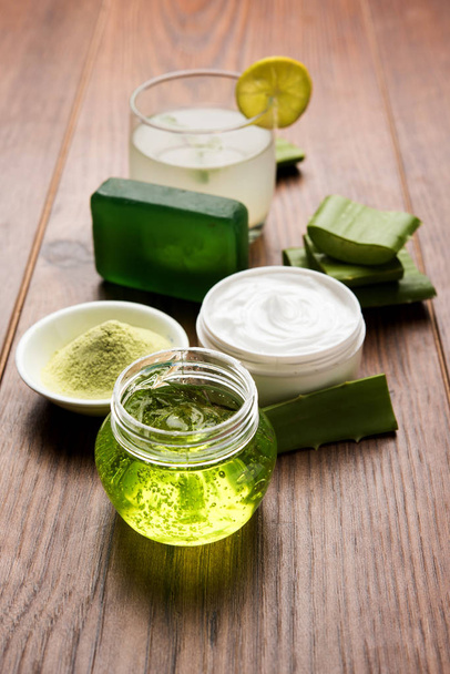 Aloe vera juice, gel, moisturising cream, soap and powder powder - Фото, зображення