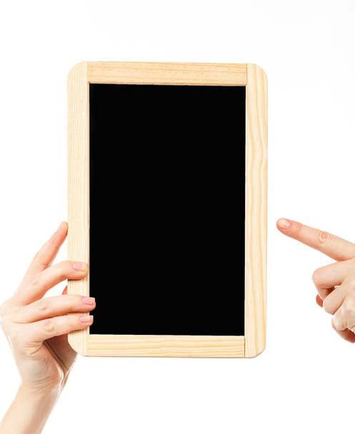 female hand holding blackboard   - Foto, afbeelding