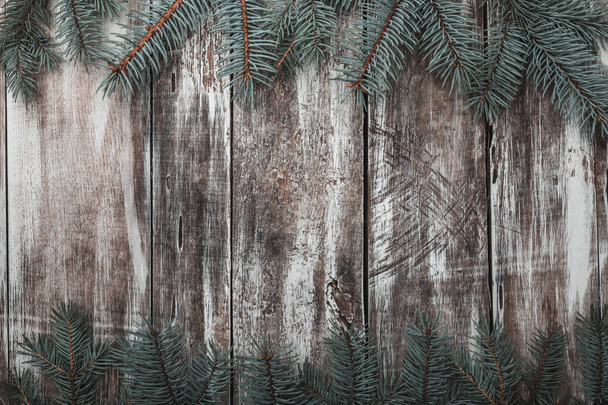 Oude, rustieke houtstructuur met natuurlijke patronen en scheuren op het oppervlak. - Foto, afbeelding