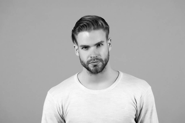 Guy with beard on face and fashionable hair - Foto, afbeelding