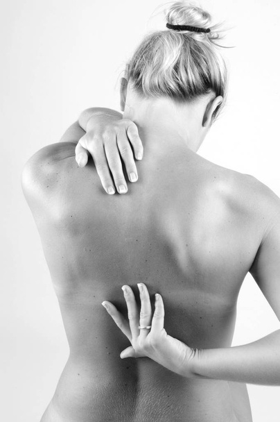 Pain Back backache ache painfull Massage neck achiness hardening tension muscle - Foto, imagen