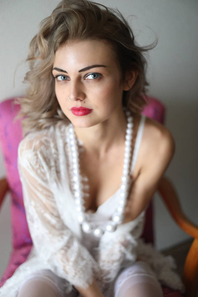 Beautiful Blond Woman with Blue Eyes  - Valokuva, kuva