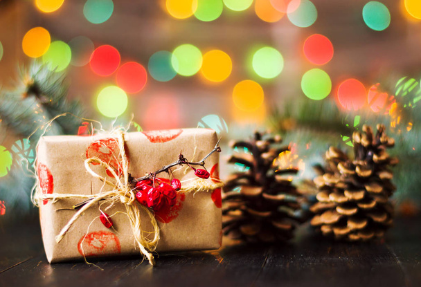 Christmas present and festive lights - Photo, Image
