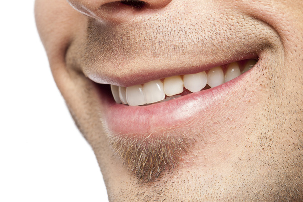 lábios de homem com um sorriso
 - Foto, Imagem