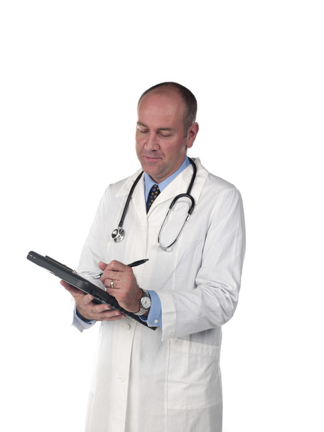 mature doctor making notes - Фото, изображение