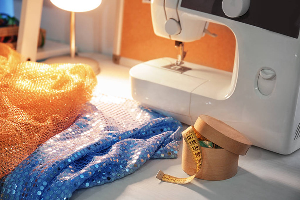 sewing machine and Sequin fabric - Photo, Image