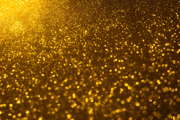 goldener Glanz Textur farbenfroh verschwommen abstrakten Hintergrund - Foto, Bild