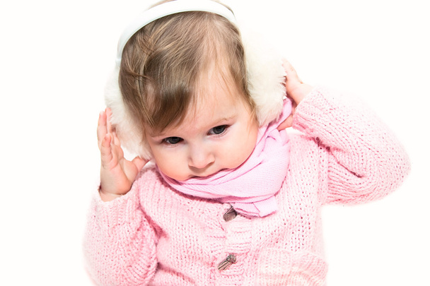 Маленька дівчинка в шубних навушниках
 - Фото, зображення