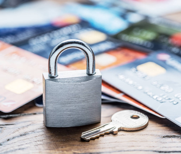 Credit cards and simle mechanical lock. - Фото, зображення