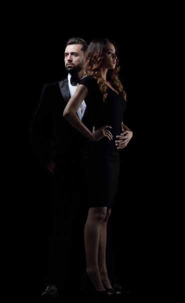 Hot girl in a black dress next to a businessman - Zdjęcie, obraz