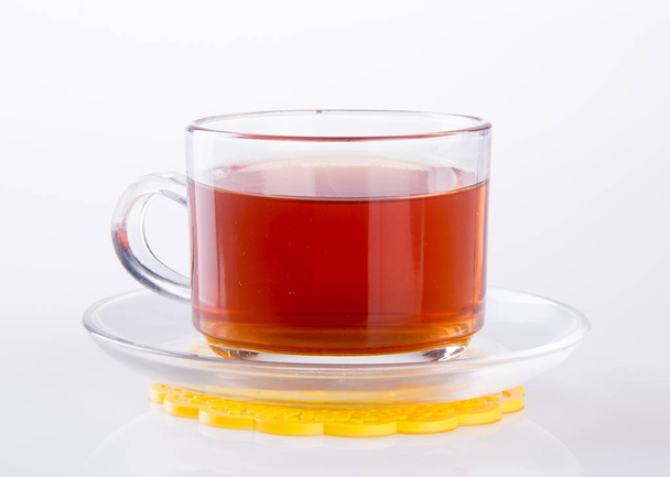 Tea in glass cup or glass cup of black tea on a background. - Foto, Imagem