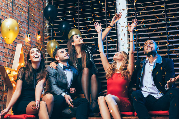 friends throwing confetti at party - 写真・画像