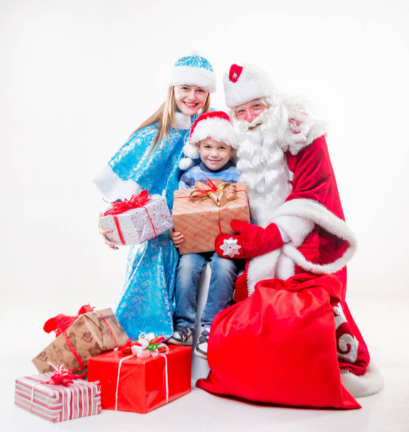 Santa Claus with little boy - Фото, зображення