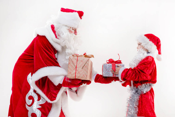 Papai Noel com menino
 - Foto, Imagem