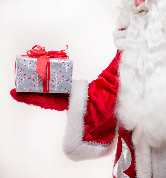Santa Claus with gift - Fotó, kép