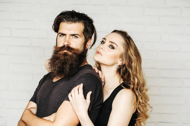 Man with beard and woman with long blond hair - Фото, изображение