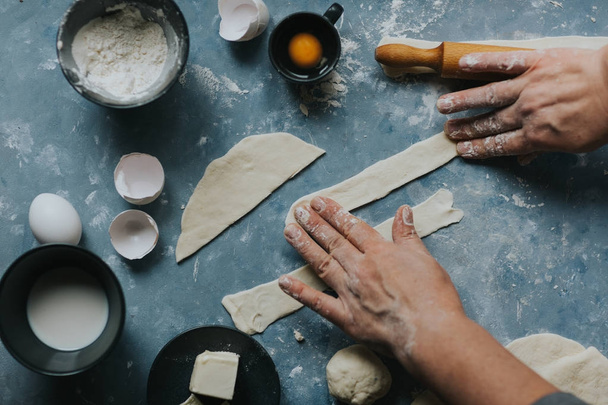 Woman working with dough. - Fotoğraf, Görsel
