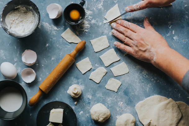 Woman working with dough. - Photo, Image