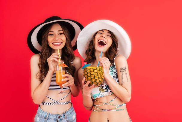 Portrait of two cheerful girls in summer clothes - Photo, Image