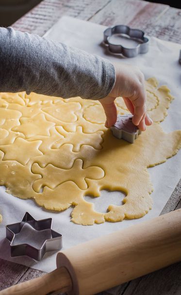 Child making Christmas cookies - Photo, Image