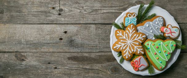 Christmas cookies on rustic wood background - Φωτογραφία, εικόνα