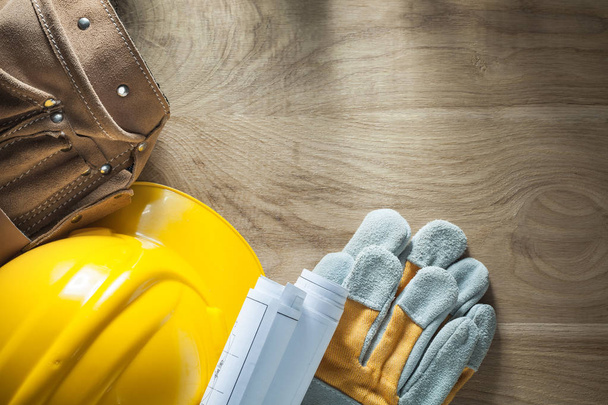 Leather tool belt construction plans safety gloves hard hat - Foto, Imagen