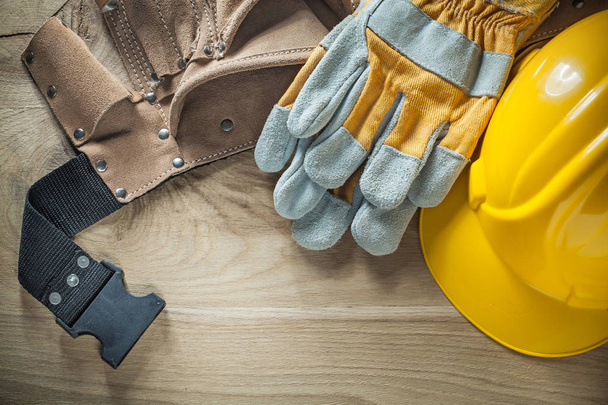 Leather tool belt protective gloves hard hat top view - Φωτογραφία, εικόνα