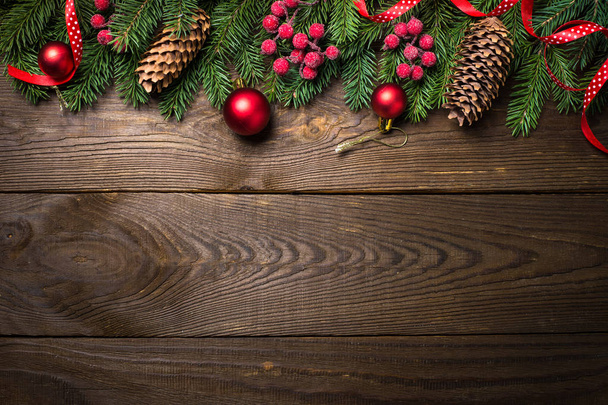 Christmas fir tree and decorations on wooden table. - Φωτογραφία, εικόνα