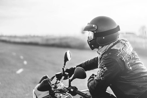 Man on sport motorcycle outdoor  - 写真・画像