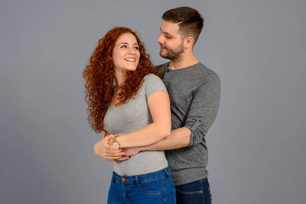 Nice young couple in the studio	 - Photo, image