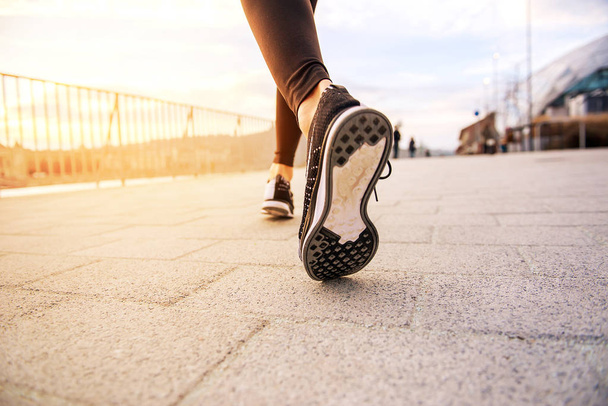 Legs of a jogging woman - Foto, Bild
