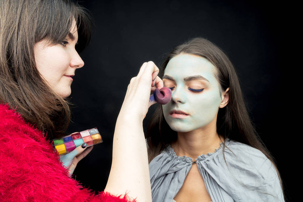 Makeup. Image of a witch in a bride dress - Fotografie, Obrázek