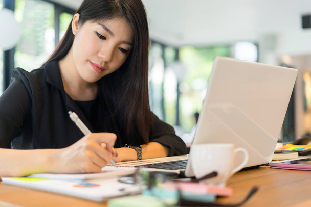 young Asian businesswoman working in office, business concept - 写真・画像