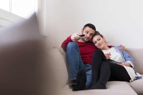 Young couple on watching television - Foto, imagen